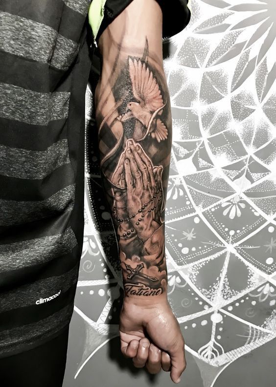 prayer hands tattoo sleeve