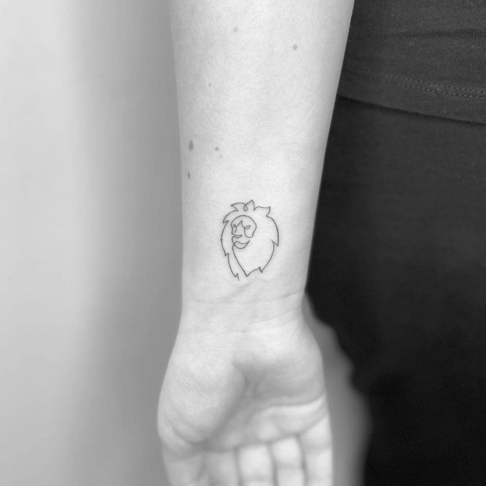 fine line lion tattoo