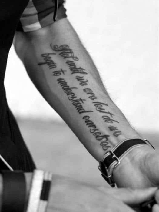 forearm writing tattoos