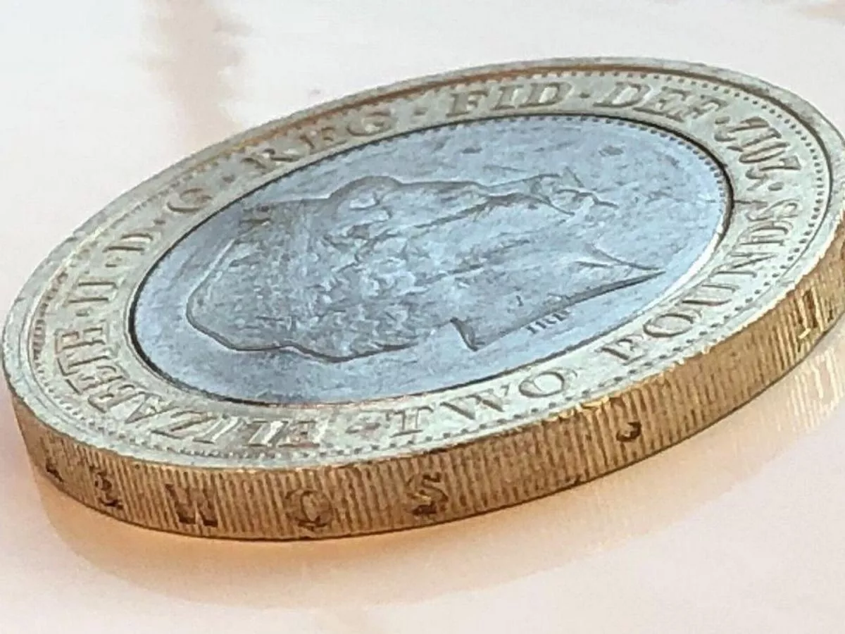 how much is the charles dickens 2 pound coin worth