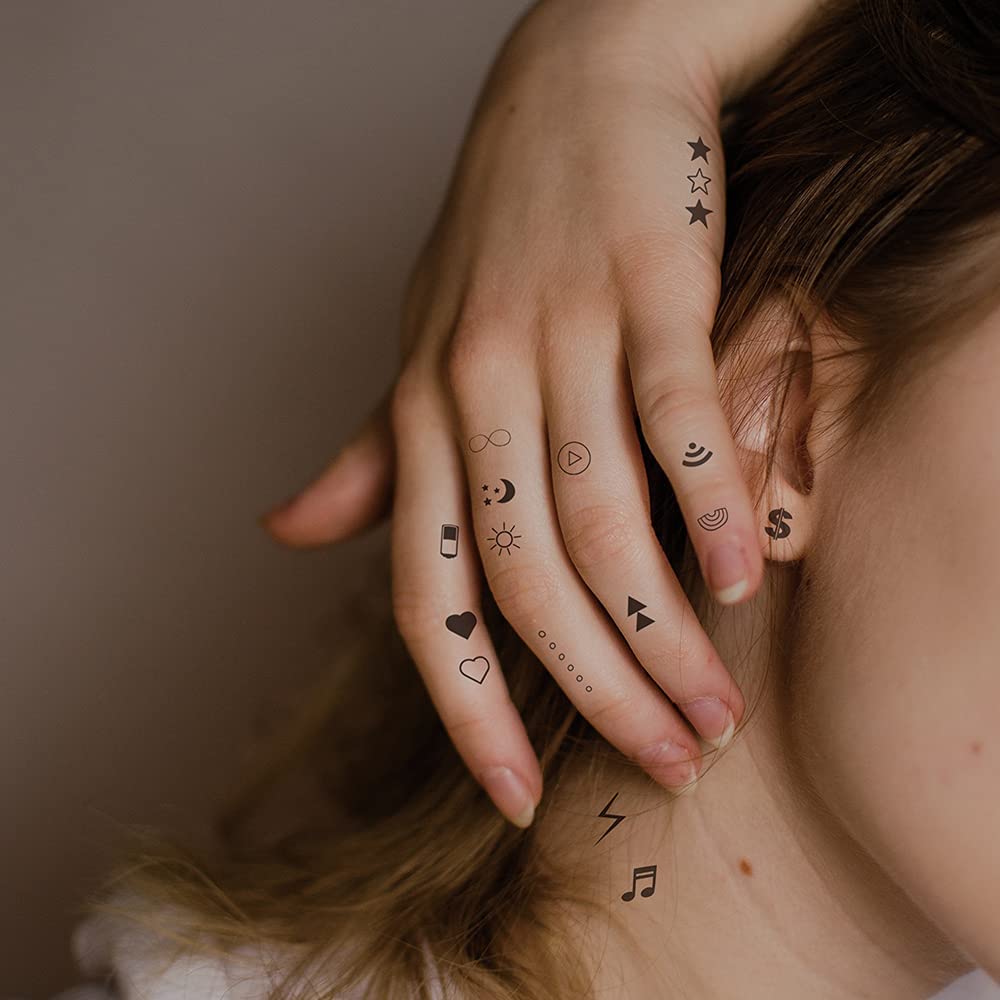 small finger tattoos