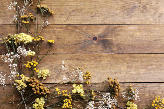 rustic wood background with flowers