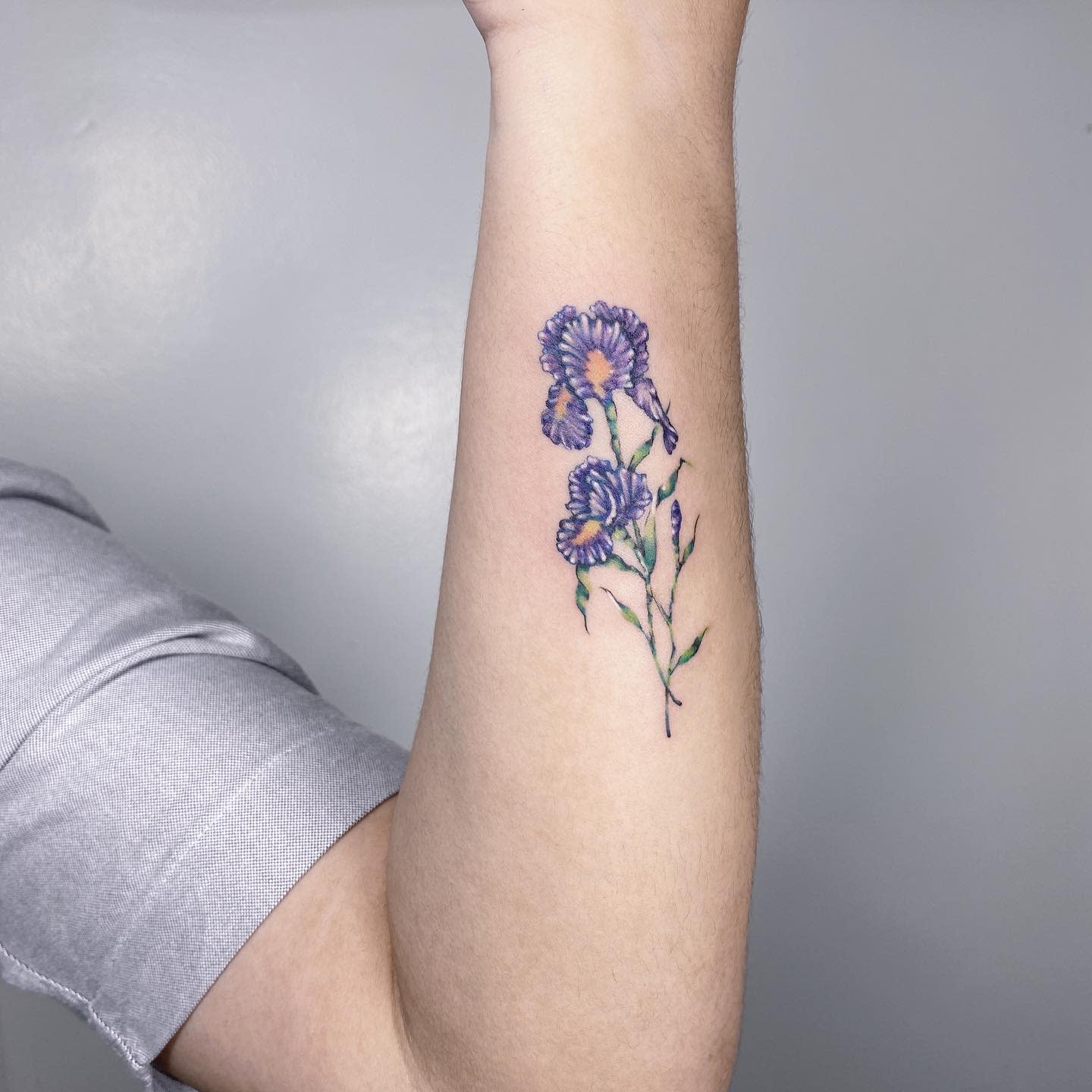 blue iris tattoo meaning