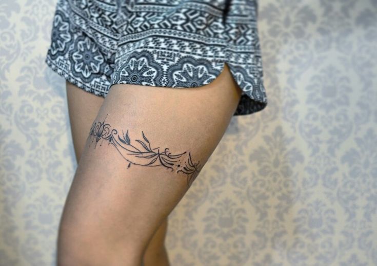 classy thigh band tattoos for females