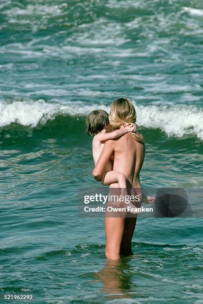 family naked at the beach