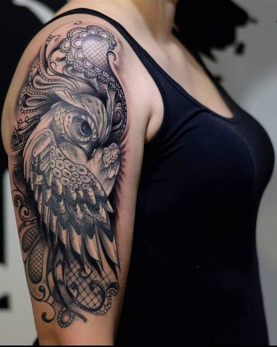 woman owl tattoo