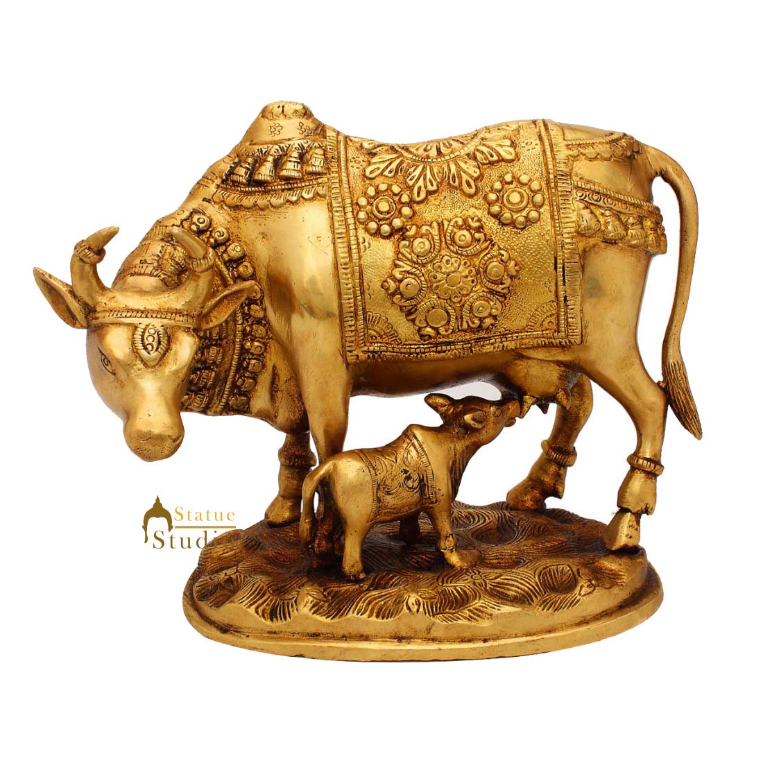 cow and calf statue in pooja room