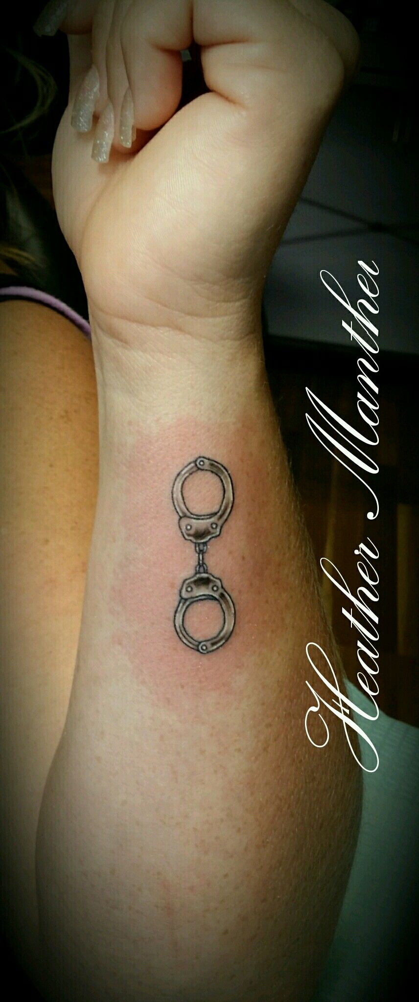 handcuff tattoo