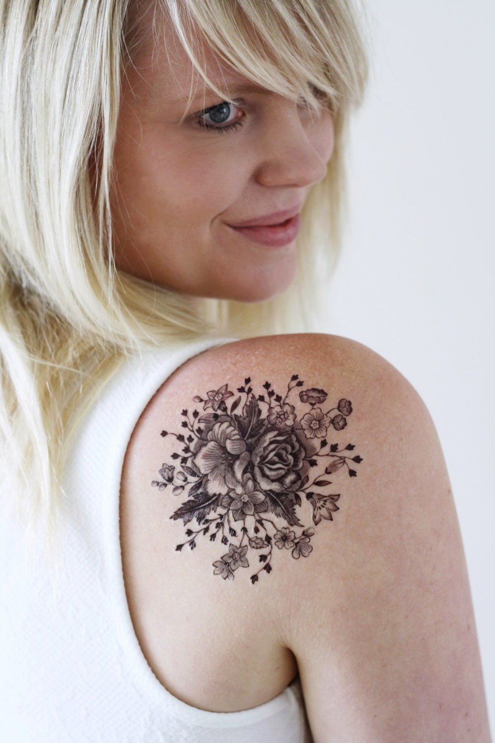 black white flower tattoo