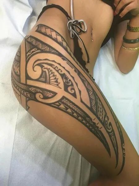 tribal tattoo on thigh