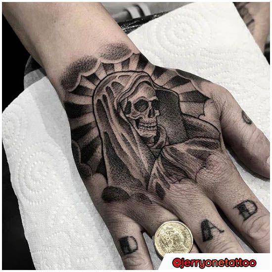 tatuajes de la santa muerte en la mano