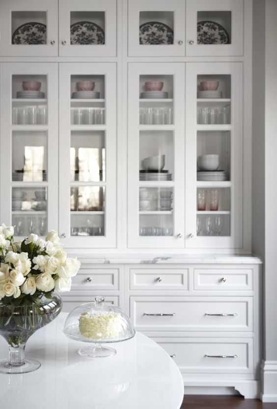 white cabinet with glass doors