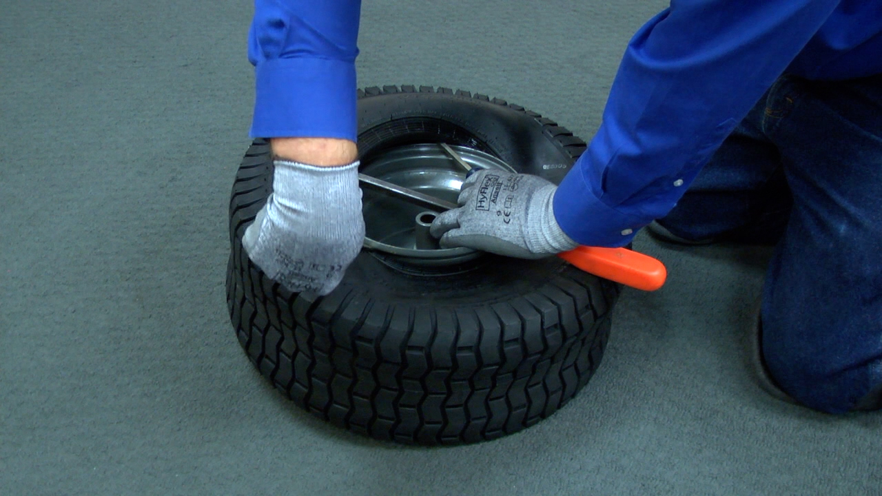 how to change a lawn mower tire