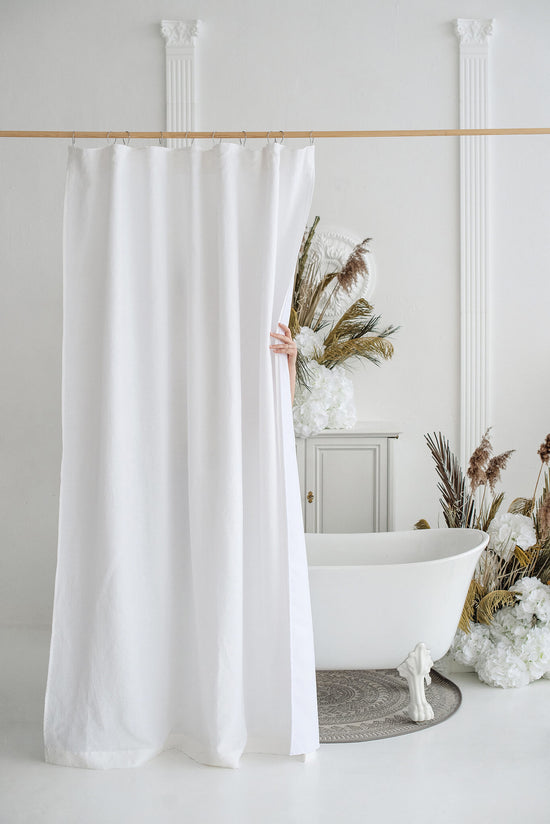 white fabric shower curtain