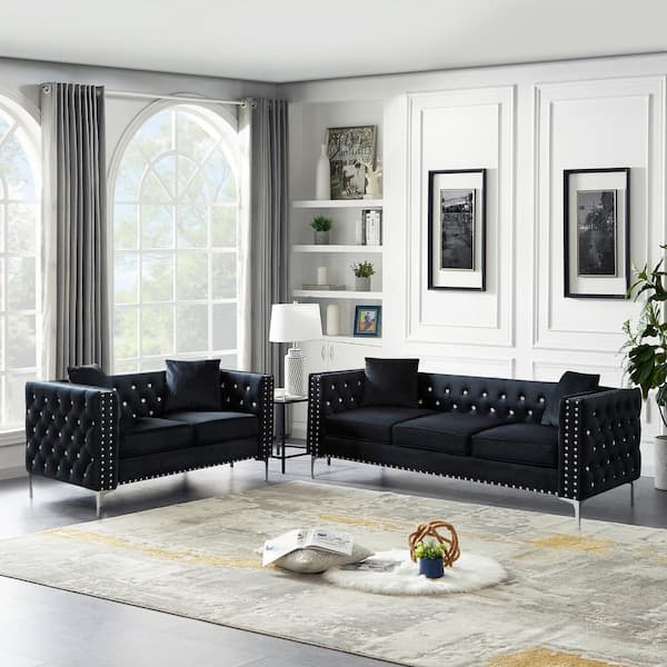 black velvet tufted sofa