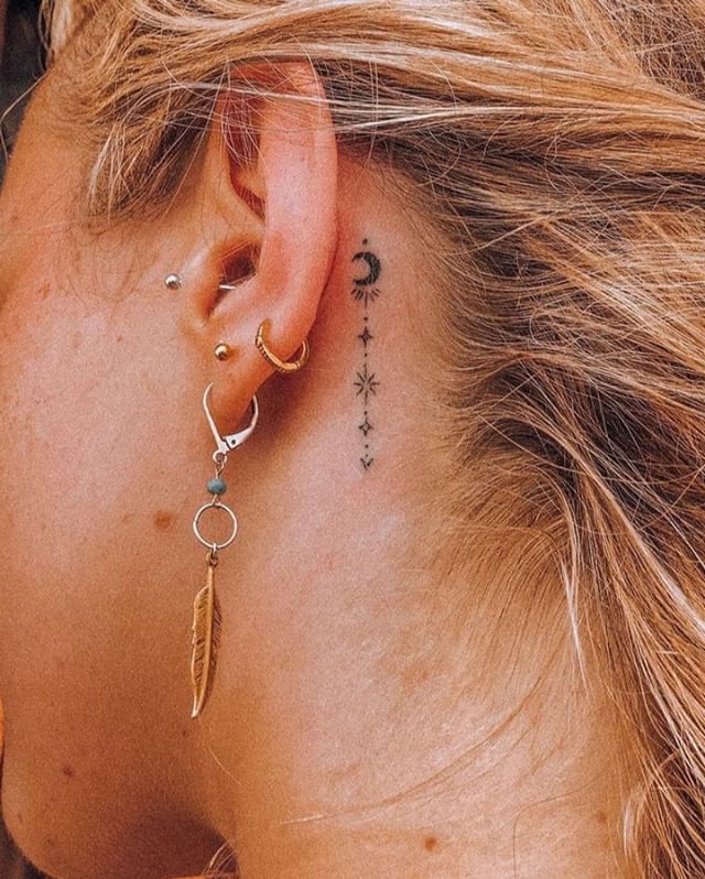 meaningful behind ear tattoos