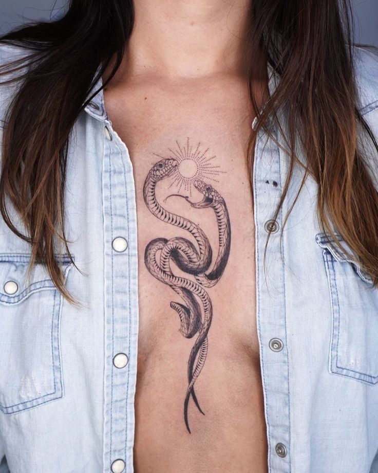 snake chest tattoo