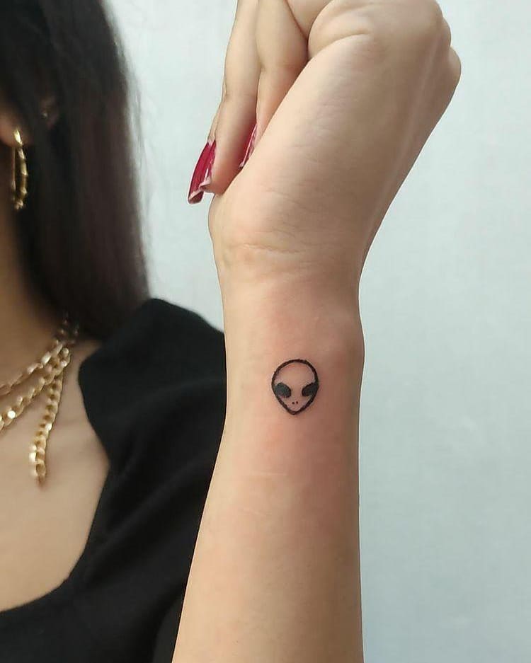 alien logo tattoo