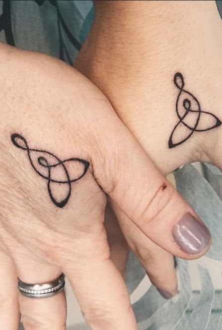 mother daughter symbol tattoo