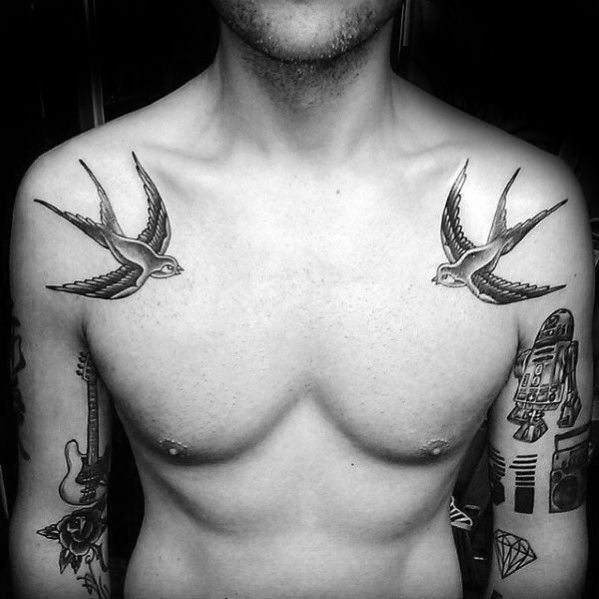 bird chest tattoo