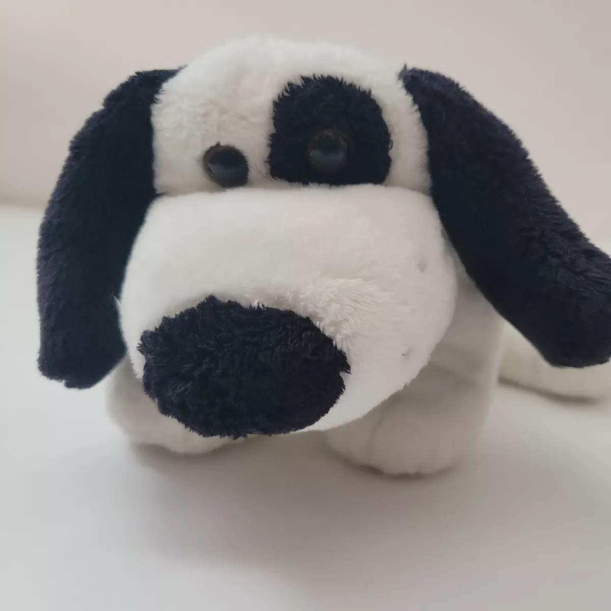 black and white dog stuffed animal