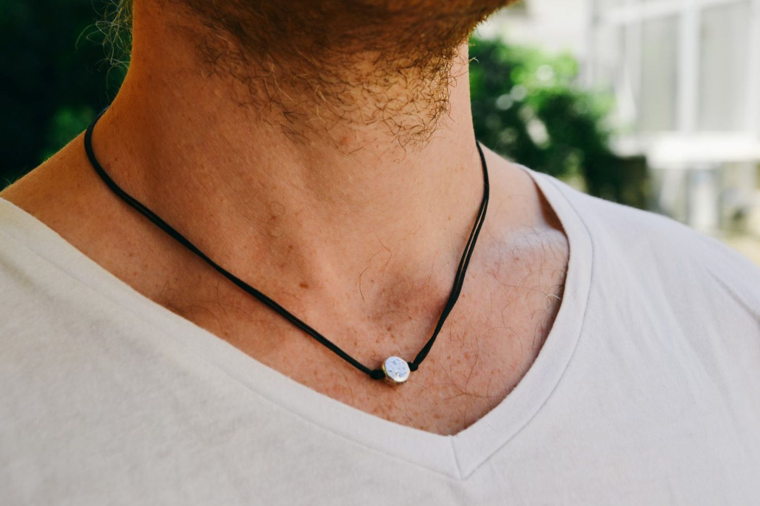 black cord necklace with pendant