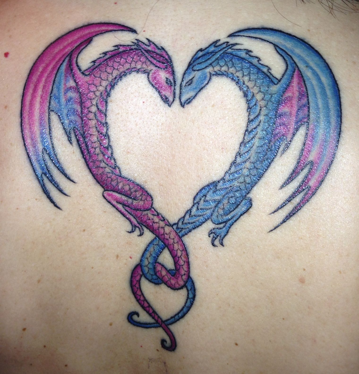 simple dragon heart tattoo