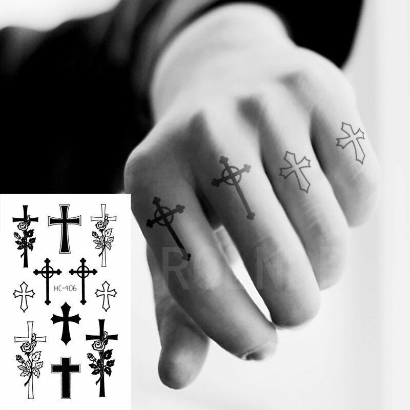 cross finger tattoo