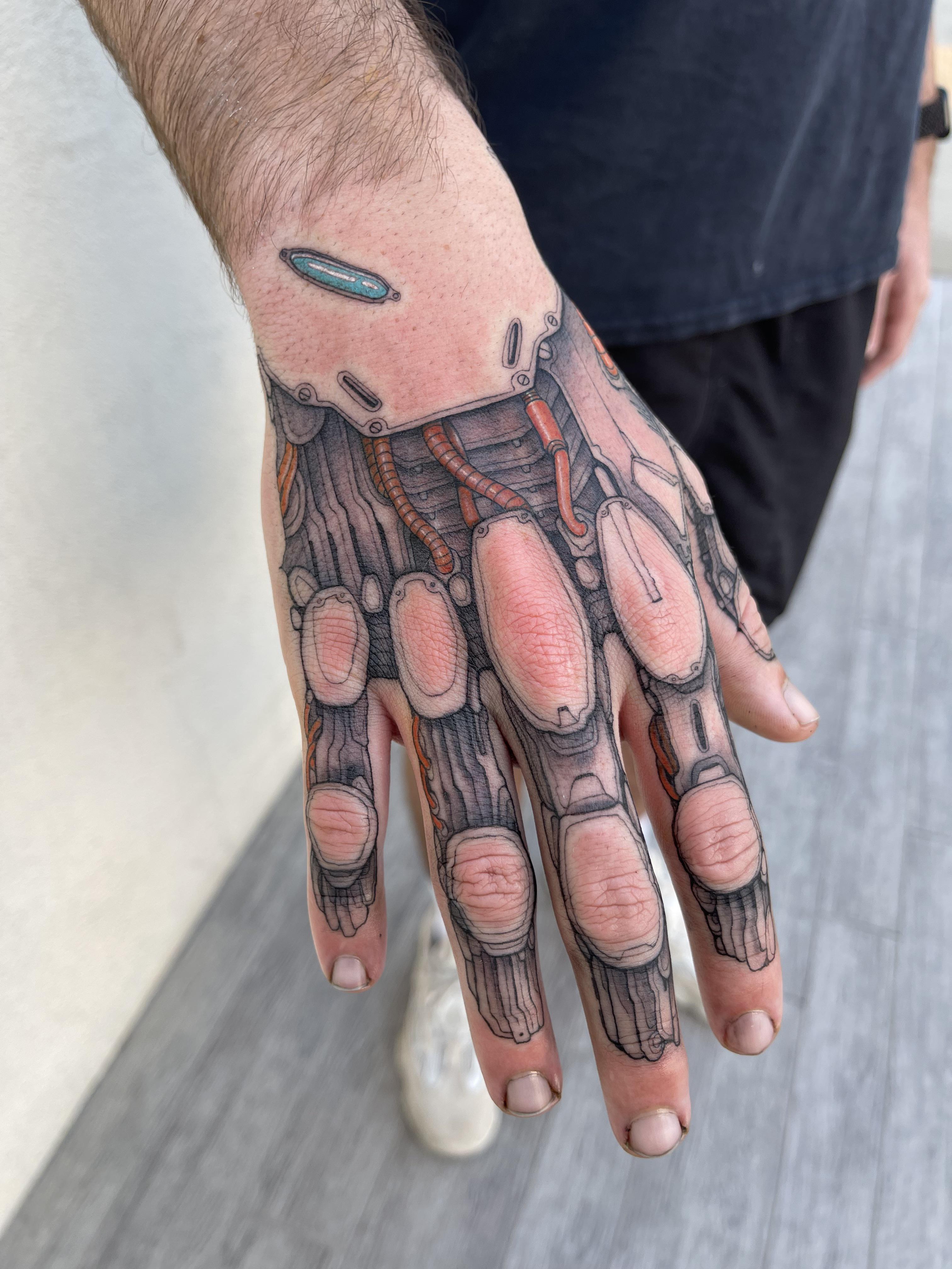 cyberpunk hand tattoo