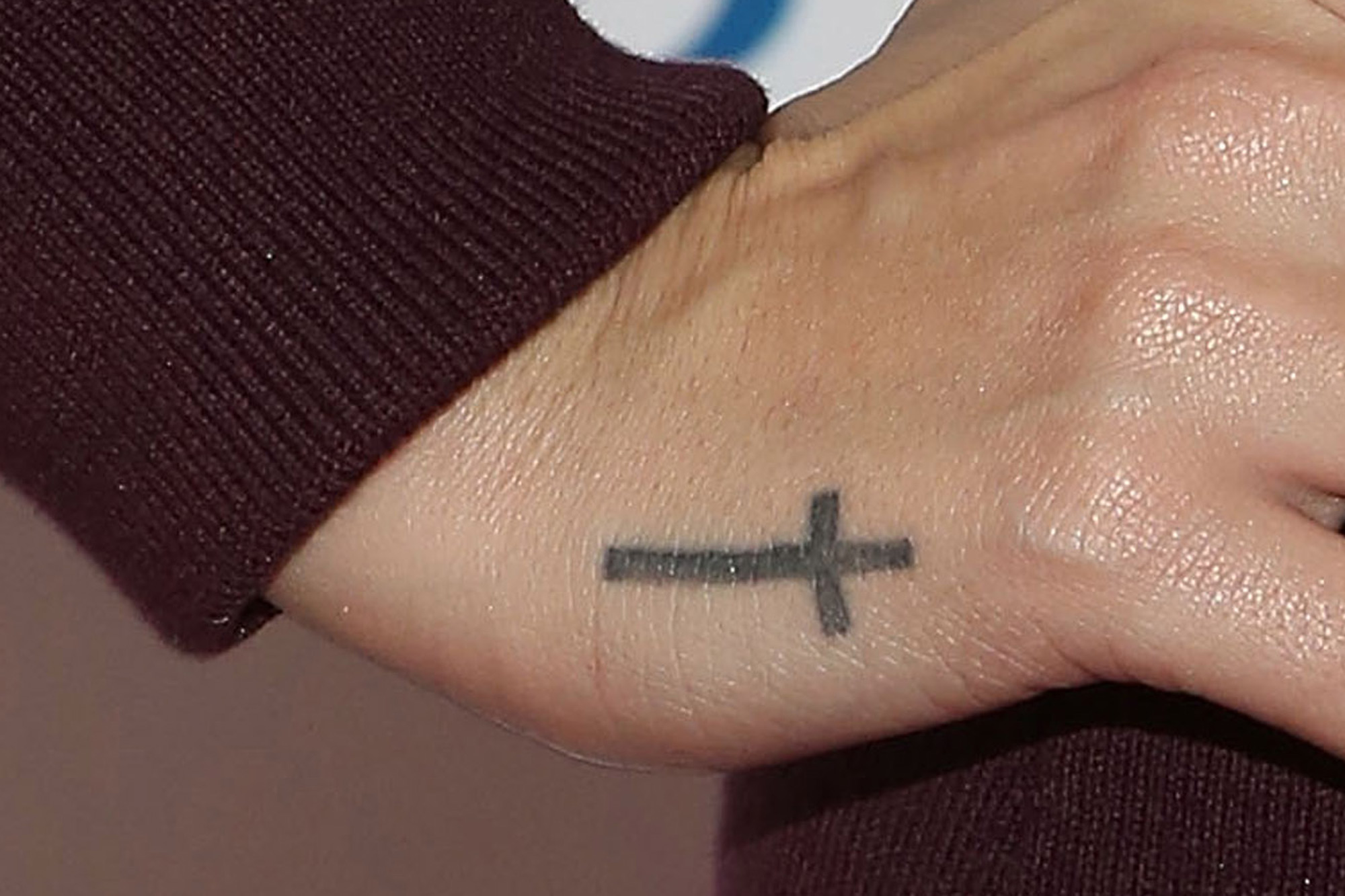 demi lovato cross tattoo