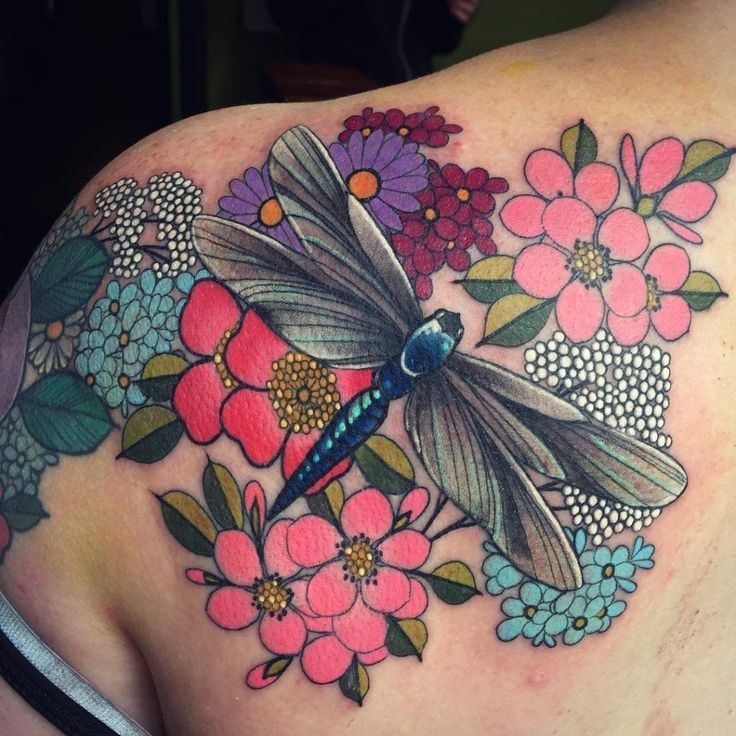 dragonfly on flower tattoo