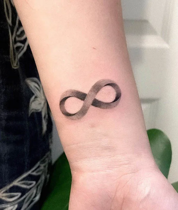 infinity sign tattoo on wrist