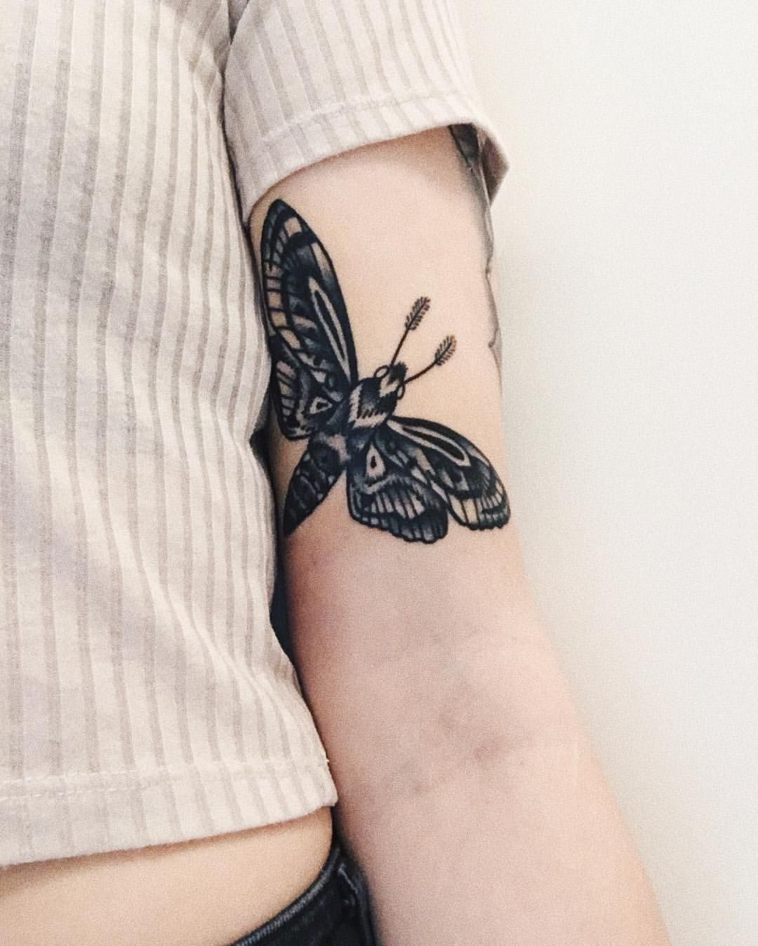 moth tattoo arm