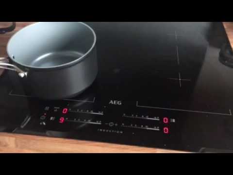 how to unlock aeg induction hob