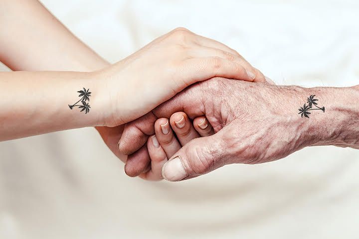 matching tattoos mom and son