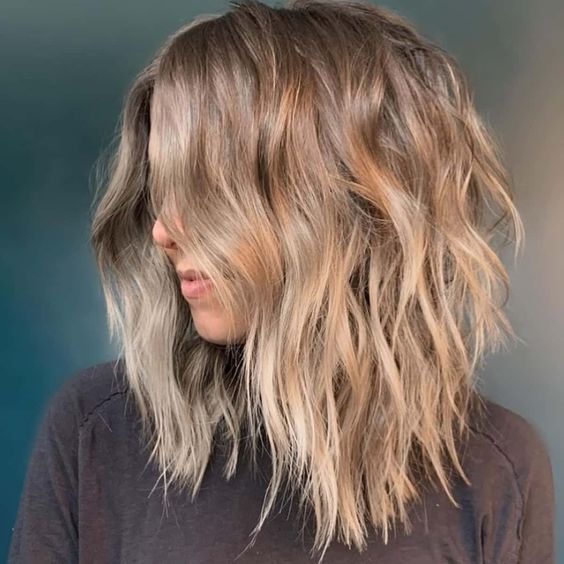 medium length hairstyles with choppy layers