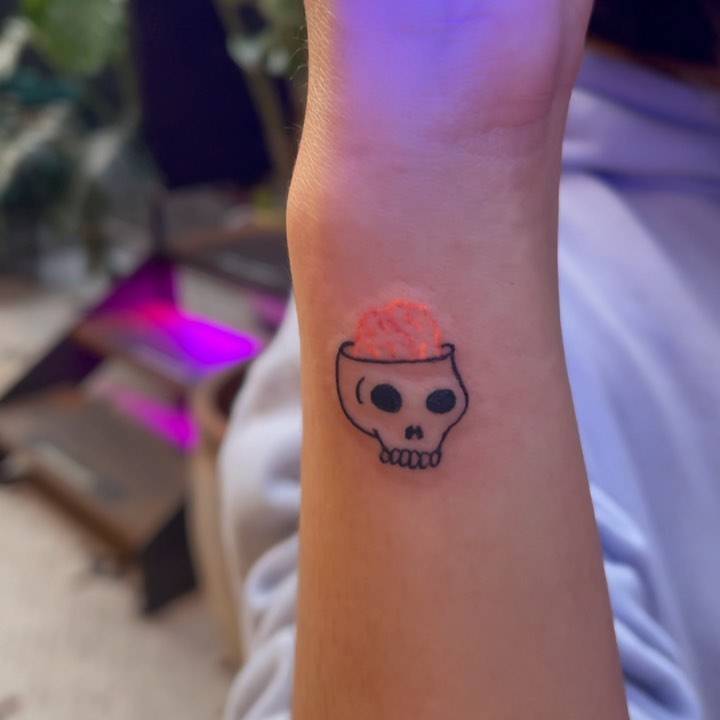 minimalist skull tattoo