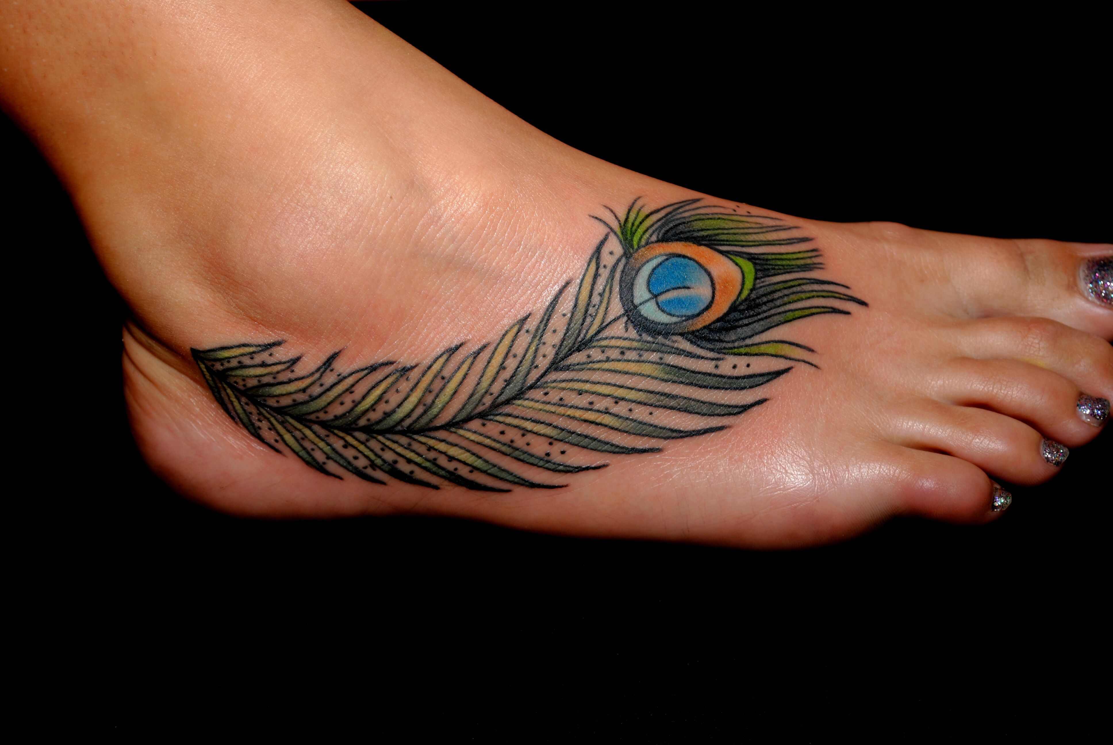 peacock foot tattoo