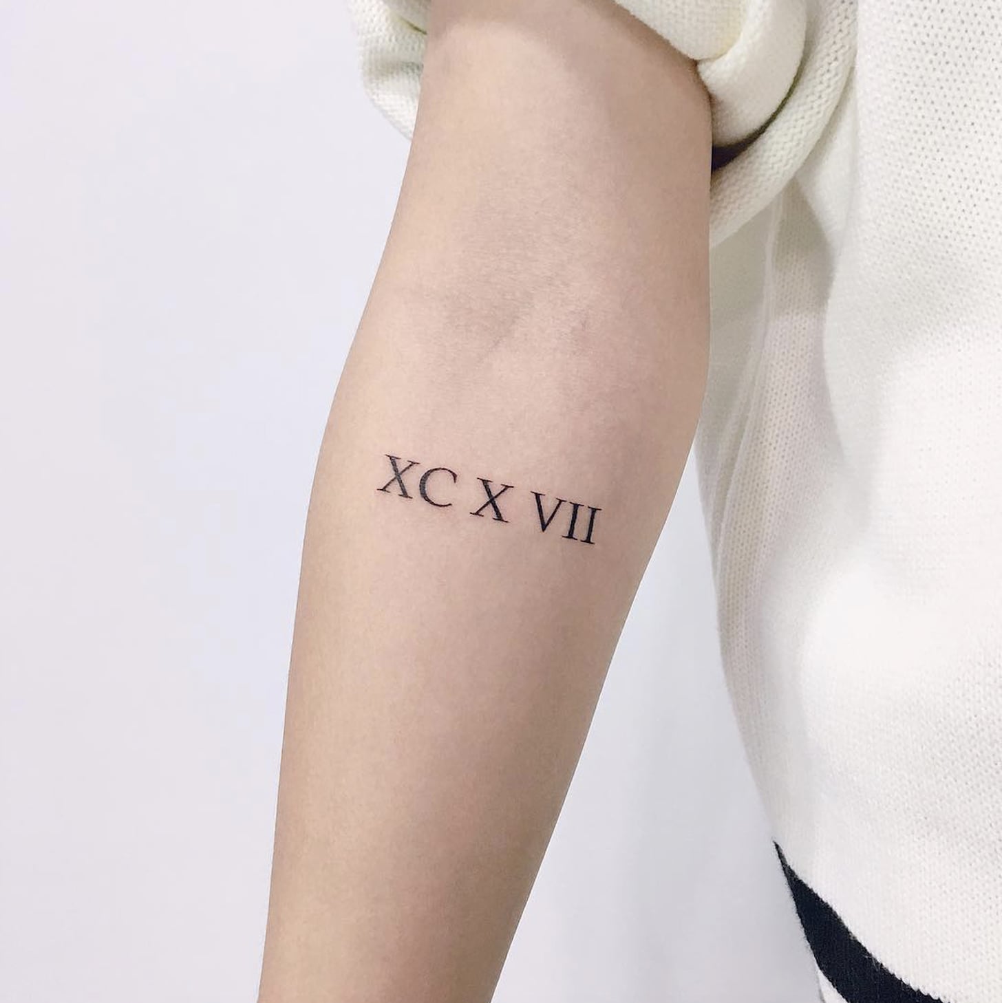 roman numeral birthday tattoo