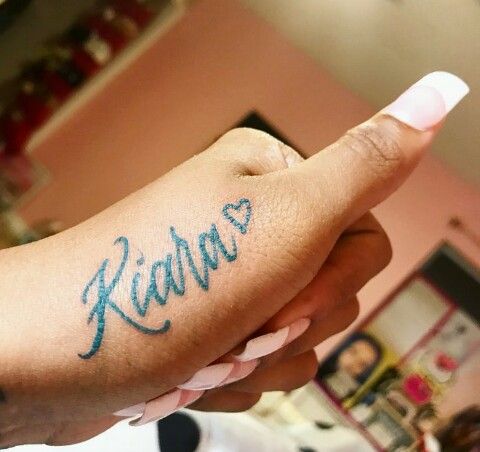 tattoos of names on hand